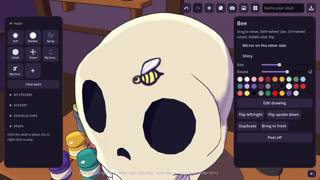Placing a bee sticker on a skull