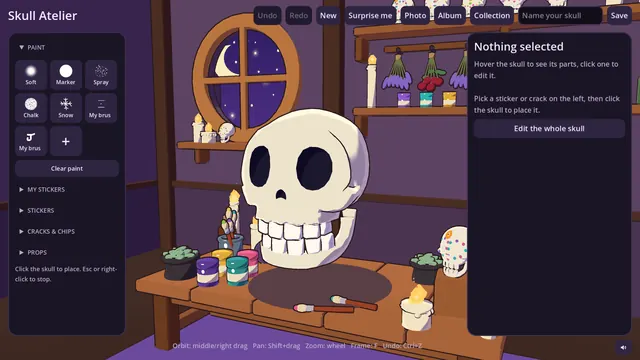 The decorating tools beside a plain skull